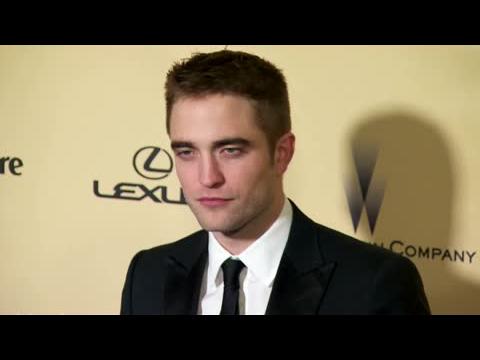 VIDEO : Robert Pattinson Parties With Fifty Shades Of Grey Author