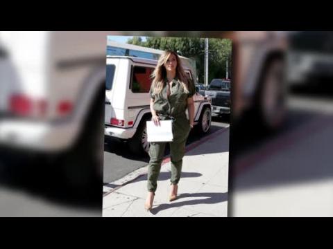 VIDEO : Kim Kardashian Sports a Green Jumpsuit For Lunch With Kourtney