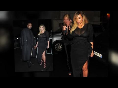VIDEO : Kim Kardashian Wows in a Sheer Necked Dress at Paris Fashion Week