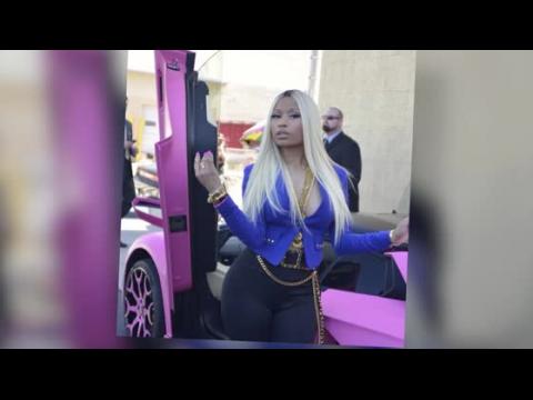 VIDEO : Nicki Minaj Goes Braless For Kmart Clothing Launch