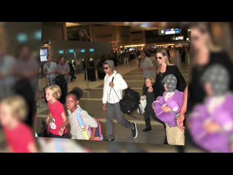 VIDEO : Angelina Jolie Guides Her Six Children Through LA Airport As The Family Relocate To Australi