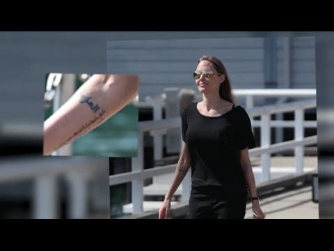 VIDEO : Angelina Jolie Sports New Tattoo In Australia