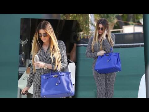 VIDEO : Khloe Kardashian Gets Back To Work With A Cryptic Selfie