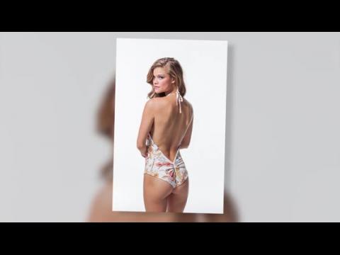 VIDEO : Nina Agdal Looks Amazing Modeling New Swimsuit Line