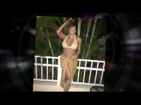 VIDEO : Mariah Carey Dazzles In Gold Bikini