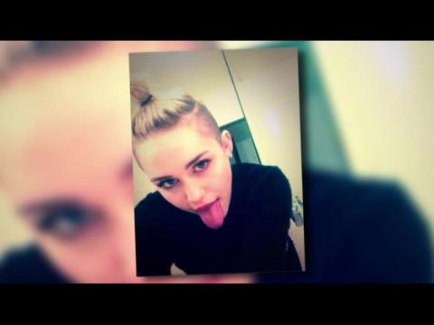 VIDEO : Miley Cyrus Makes Fun of the Cover of In Touch Magazine