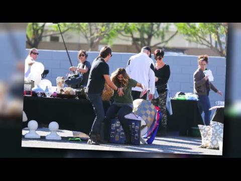 VIDEO : Kim Kardashian Takes a Tumble at Charity Yard Sale