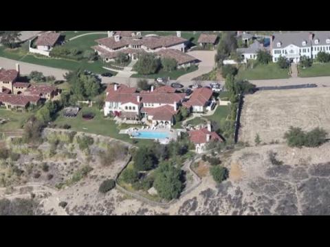 VIDEO : Kourtney Kardashian y Scott Disick se mudan a su nueva casa cerca de Justin Bieber