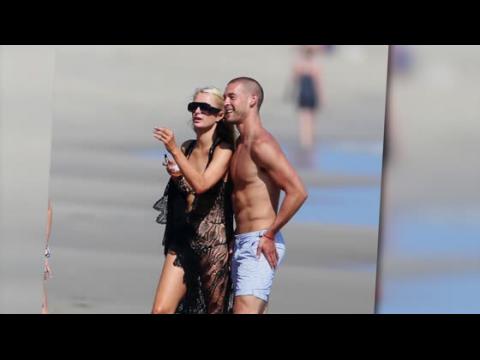 VIDEO : Paris Hilton Gets Cozy With A New Man in Malibu