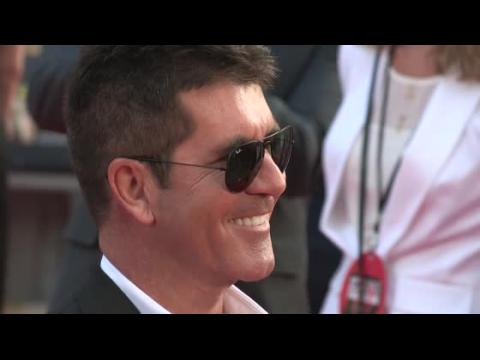 VIDEO : Simon Cowell Reveals He's 'Proud' To Be A Dad At One Direction Film Premiere