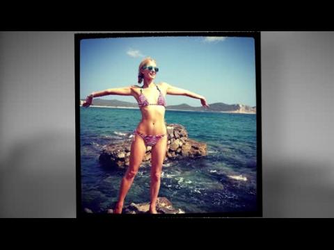 VIDEO : Paris Hilton Flaunts Her Figure In A Zebra Print Bikini In Ibiza