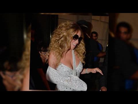 VIDEO : Mariah Carey Bedazzles Her Sling, Heals In Style