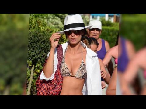 VIDEO : Elisabetta Canalis Nearly Slips Out Of Her Tiny Bikini