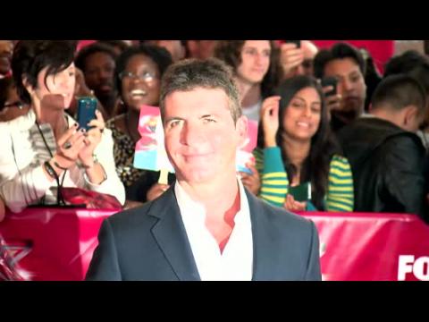 VIDEO : Simon Cowell Refuses To See Baby Mama Till Drama Settles