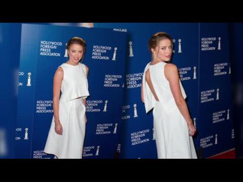 VIDEO : Amber Heard Flaunts Her Midriff In A Slashed White Ensemble At Star-Studded Luncheon