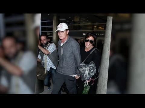 VIDEO : Kris and Bruce Jenner Return From Thailand Holding Hands