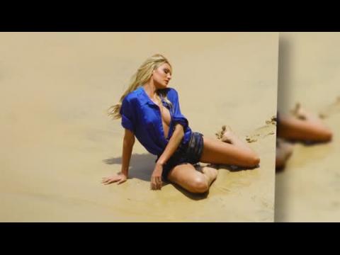 VIDEO : Candice Swanepoel pendant une sance photo sexy  la plage