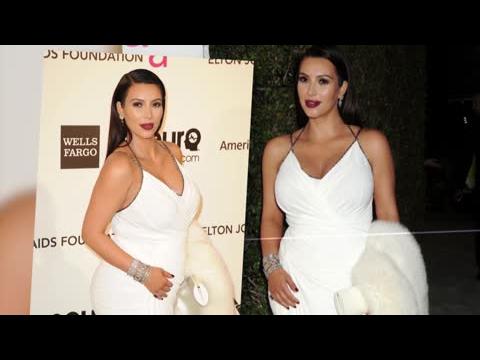 VIDEO : Kim Kardashian Dvoile Son Ventre Dans Une Robe Blanche Au Dcollet Plongeant